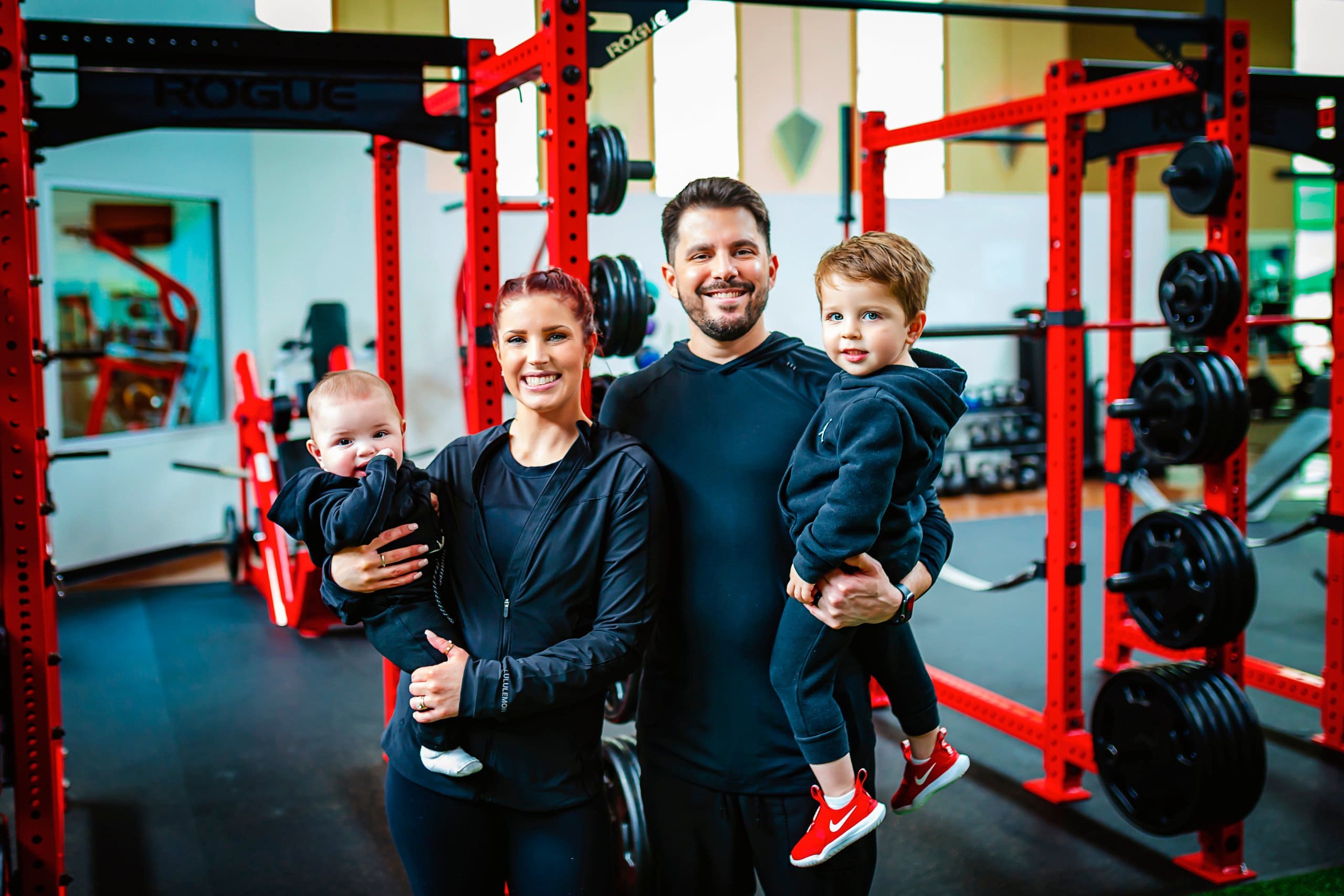 pursuit fitness monroe gym owners with kids showing the importance of a gym with onsite child care