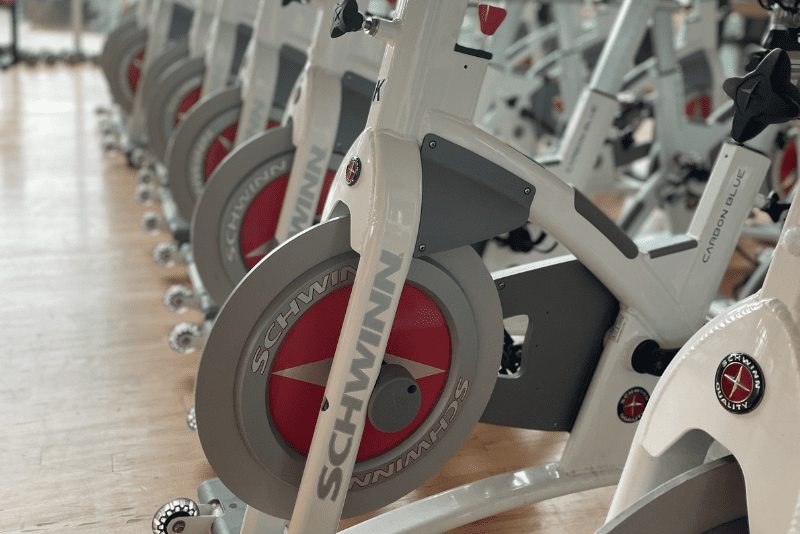 an indoor spinning studio for group fitness classes at a monroe gym pursuit fitness