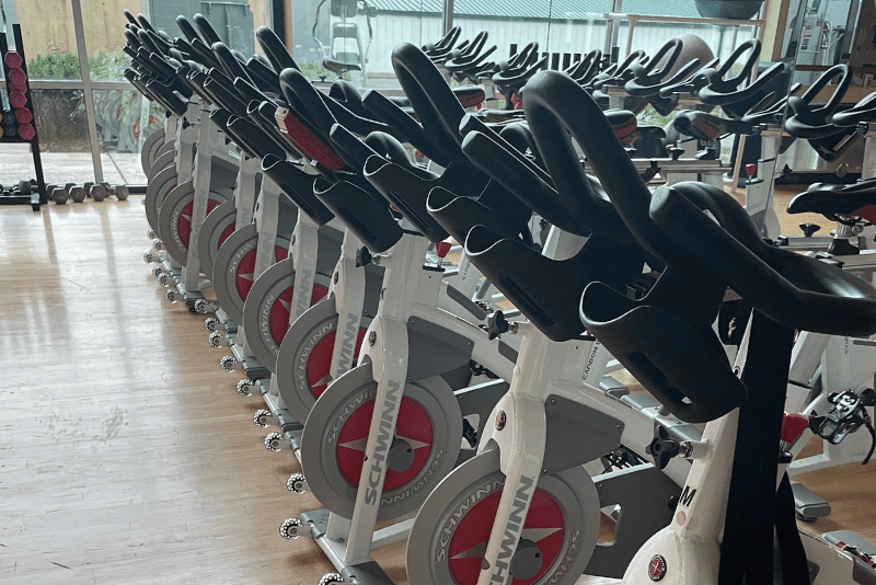 an indoor spinning studio for group fitness classes at a monroe gym pursuit fitness